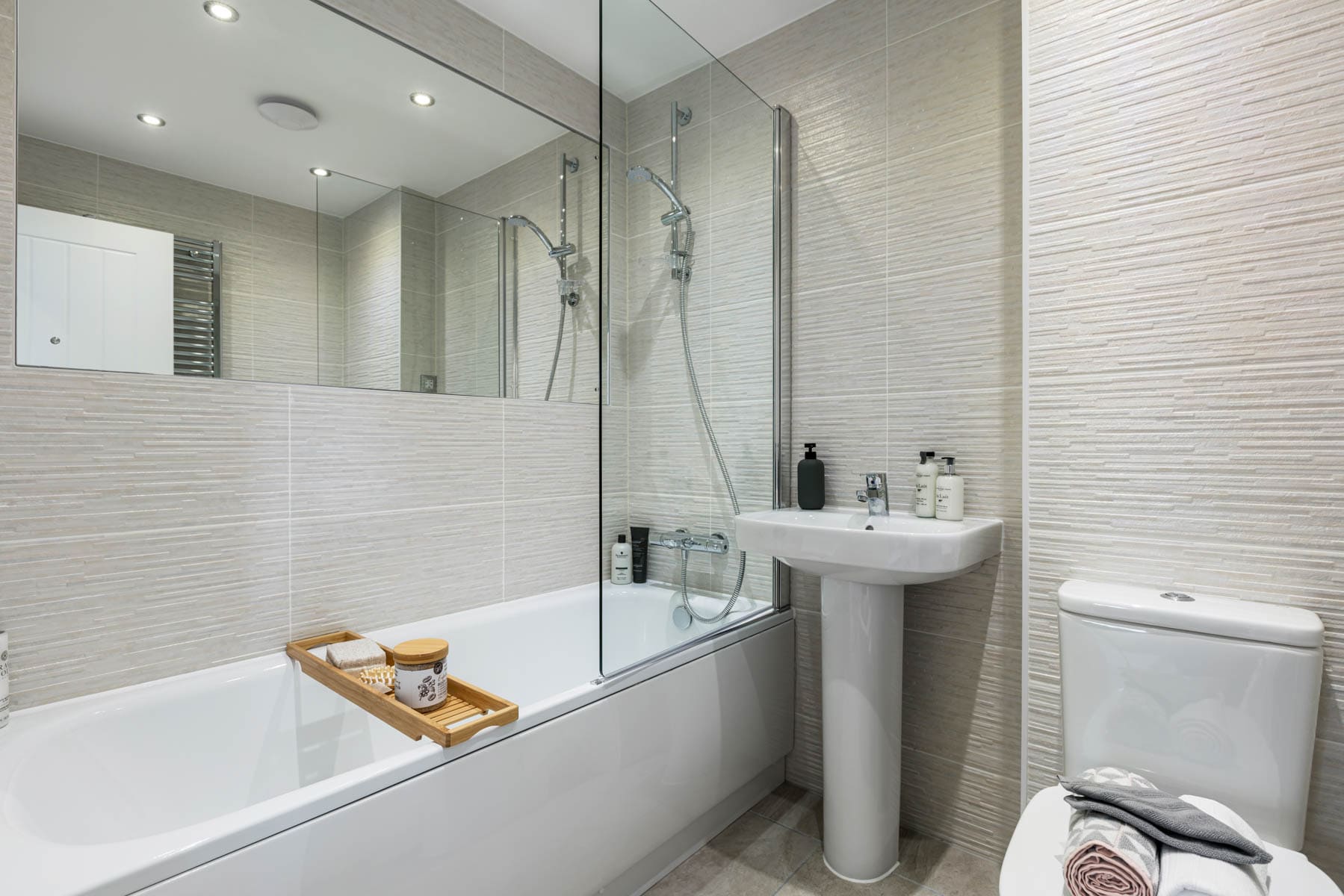 Bathroom with shower over the bath