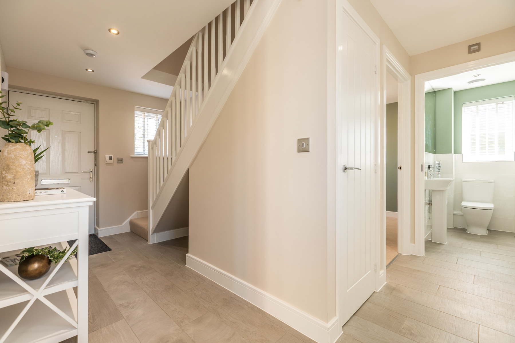 Entrance hallway with storage cupboard