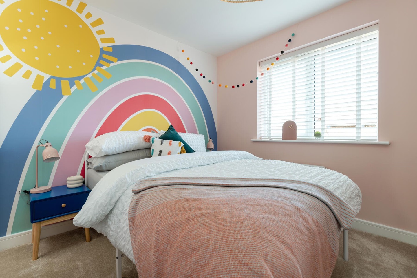 Double bed with rainbow