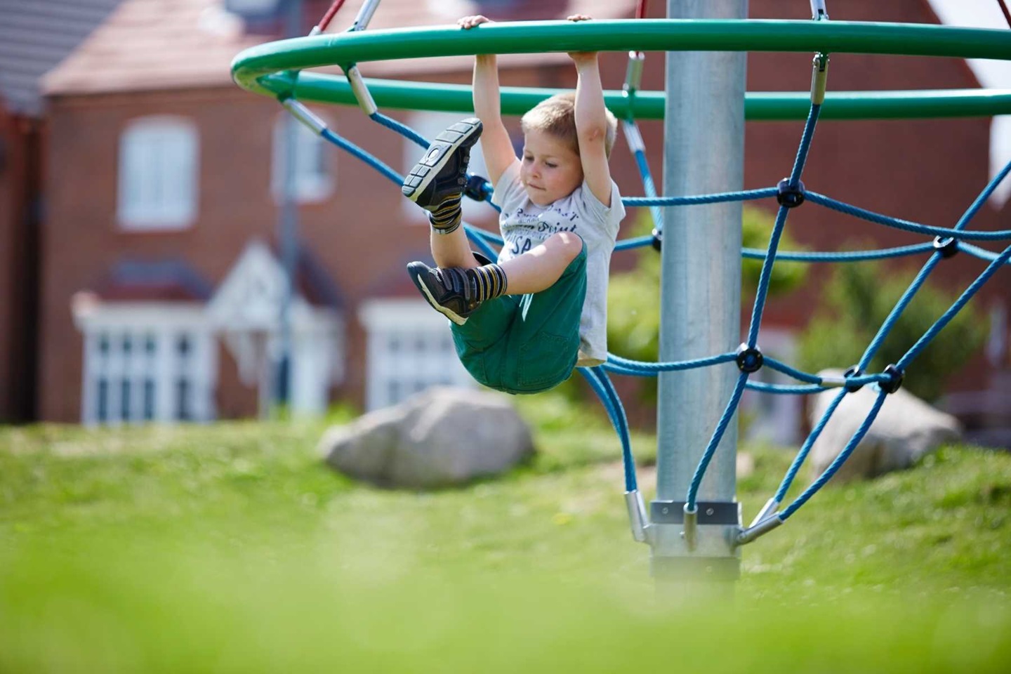 Boy on climbing frame