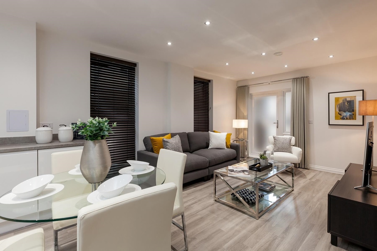 Double doors lead out to a Juliet balcony