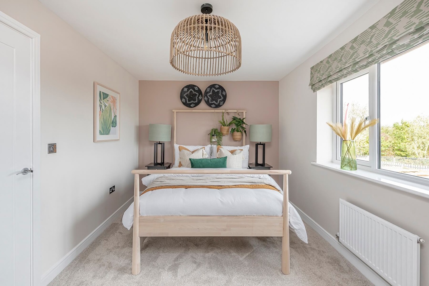 The second double bedroom welcomes plenty of natural light