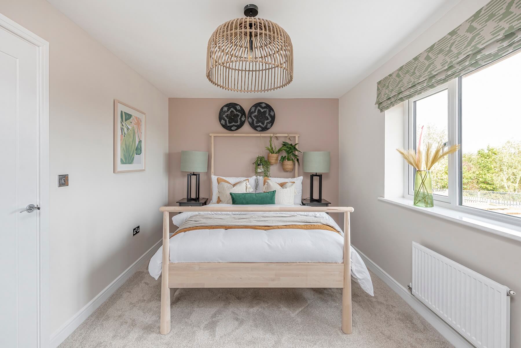The second double bedroom welcomes plenty of natural light