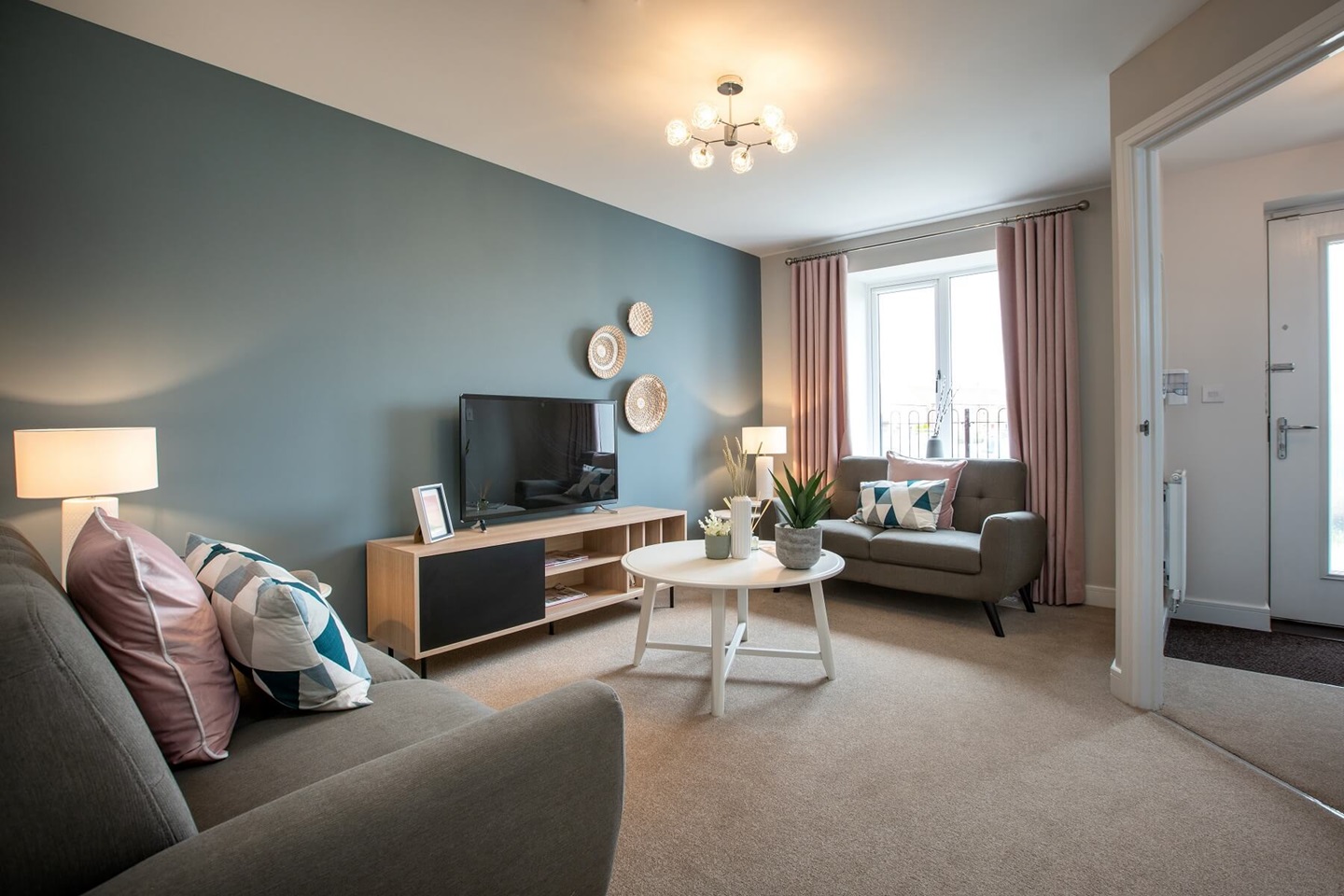 The cosy living room creates the perfect space to relax