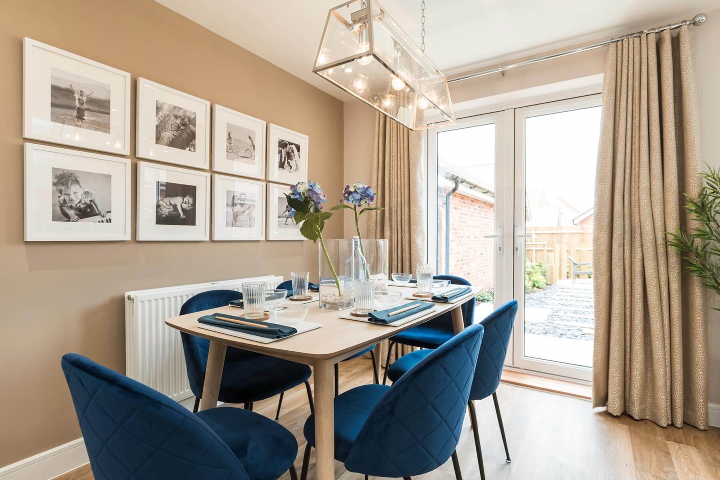 The kitchen/dining area boasts double doors out to the garden