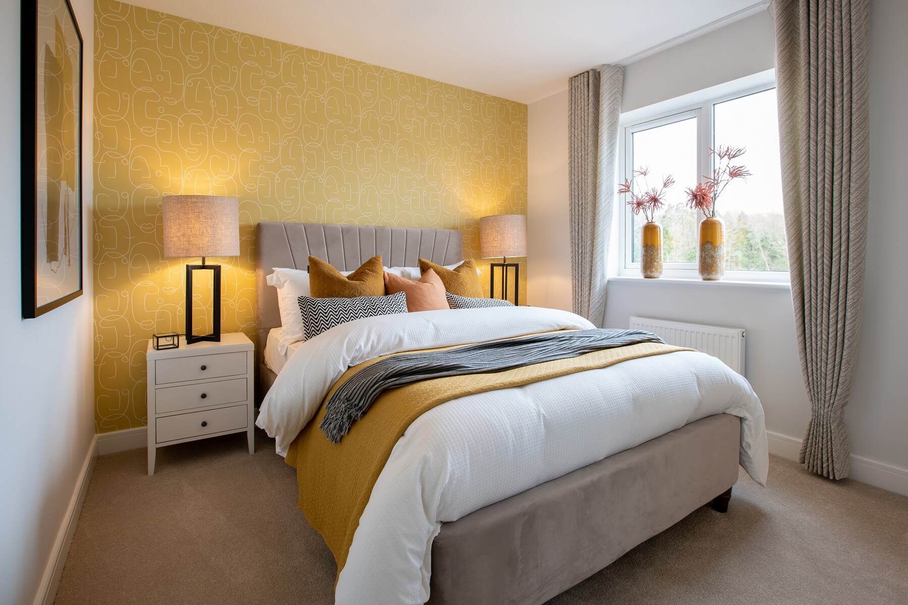 The main bedroom offers plenty of space to unwind and relax
