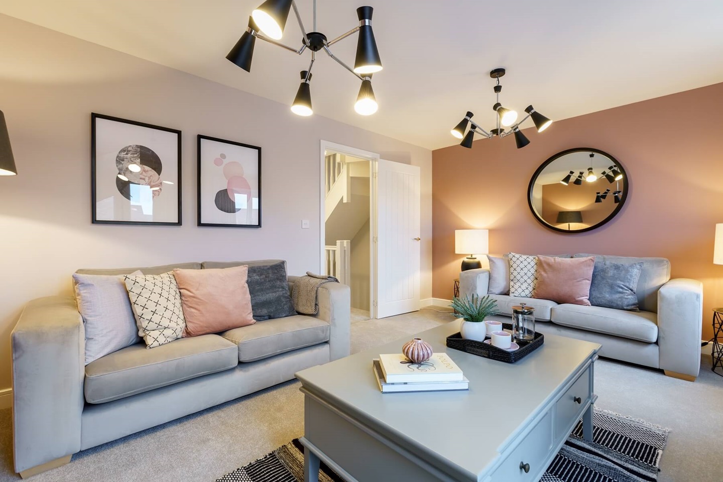 The first floor living room features a Juliet balcony