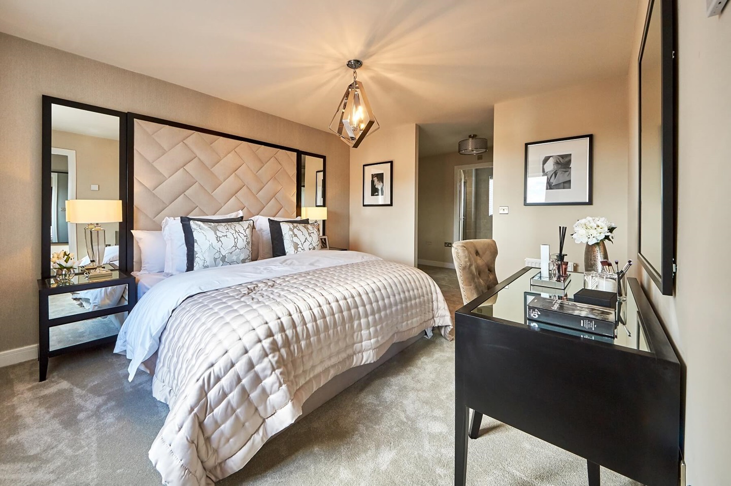 The main bedroom features an en suite shower room for added luxury