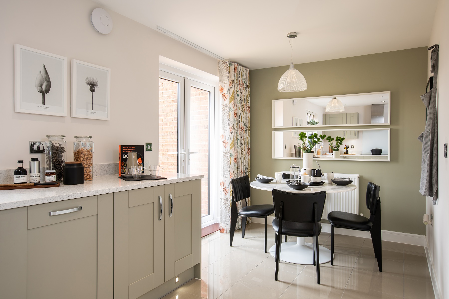 The breakfast area boasts double doors out to the garden