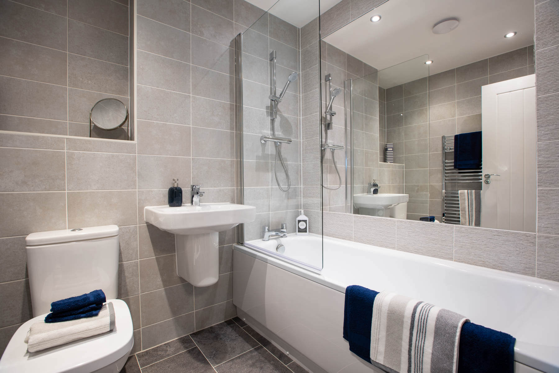 A main bathroom with high quality fixtures and fittings