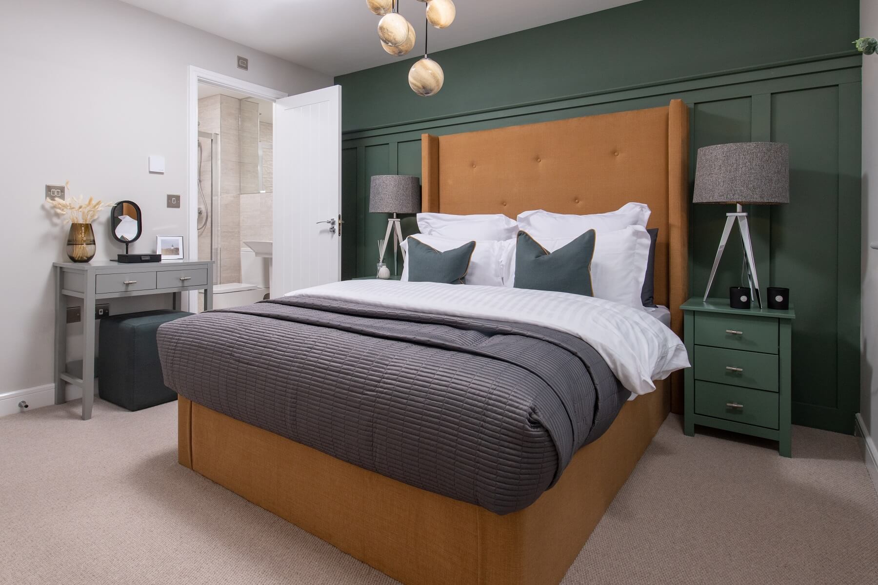 The main bedroom boasts an en suite for added luxury