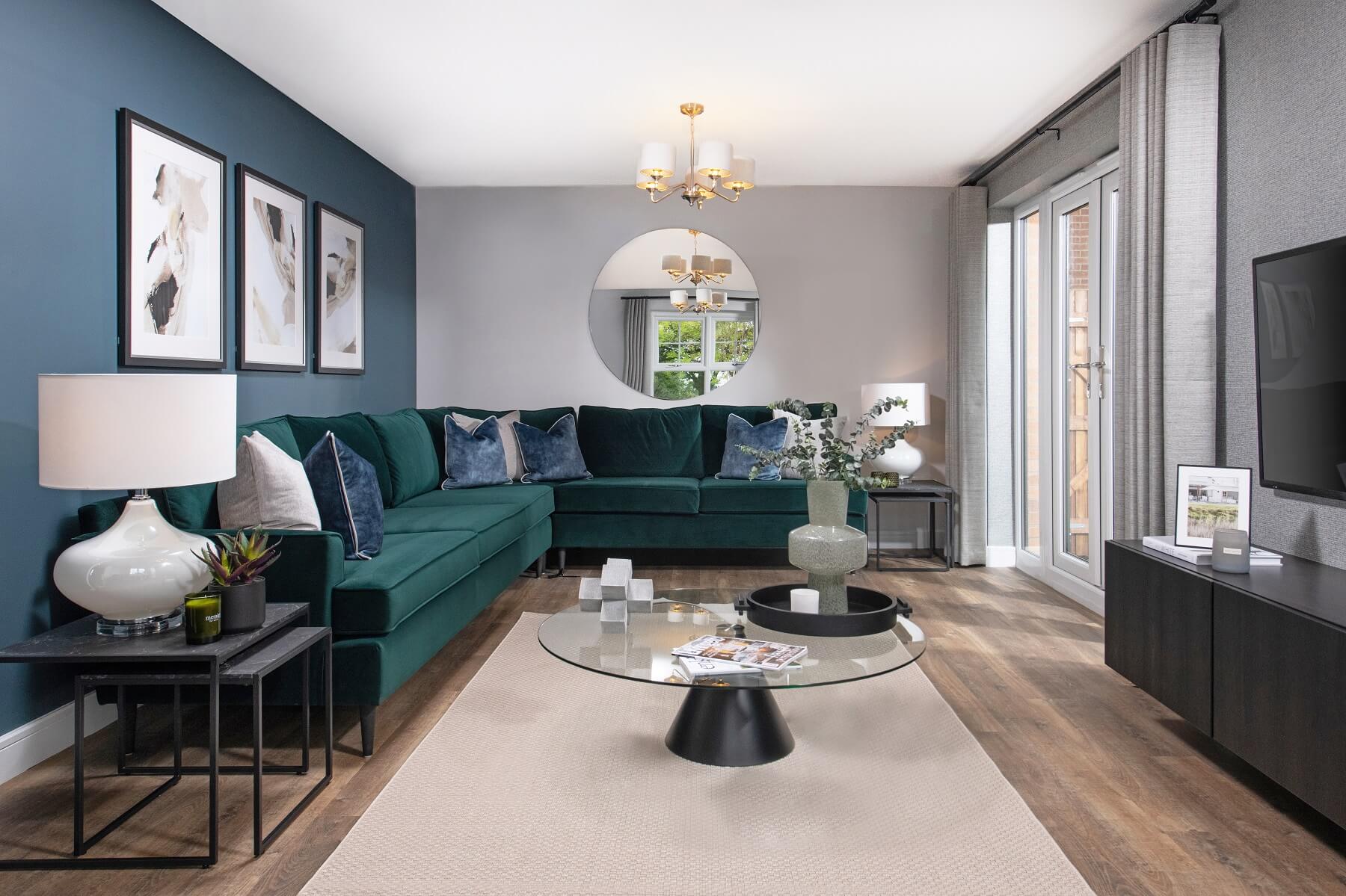 The  living room features double doors out to the garden