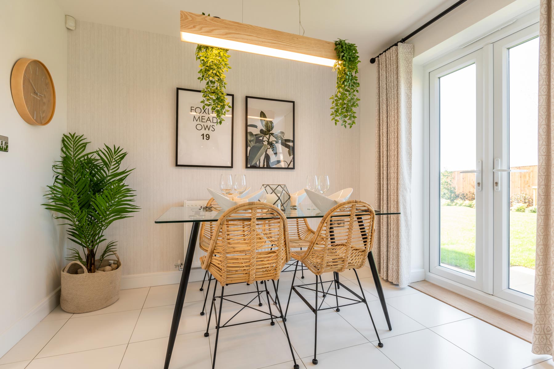 The dining area features double doors out to the rear garden