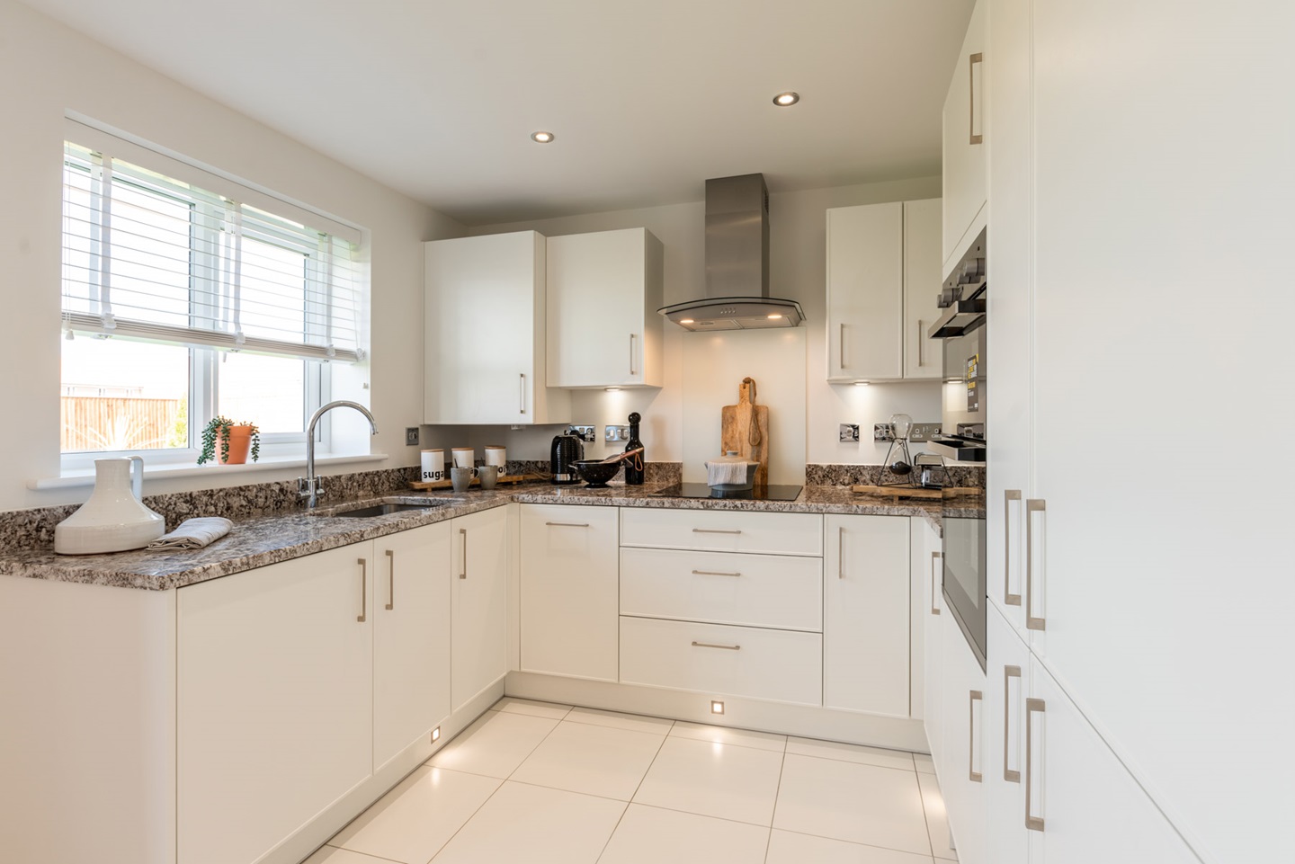 The modern kitchen benefits from ample storage