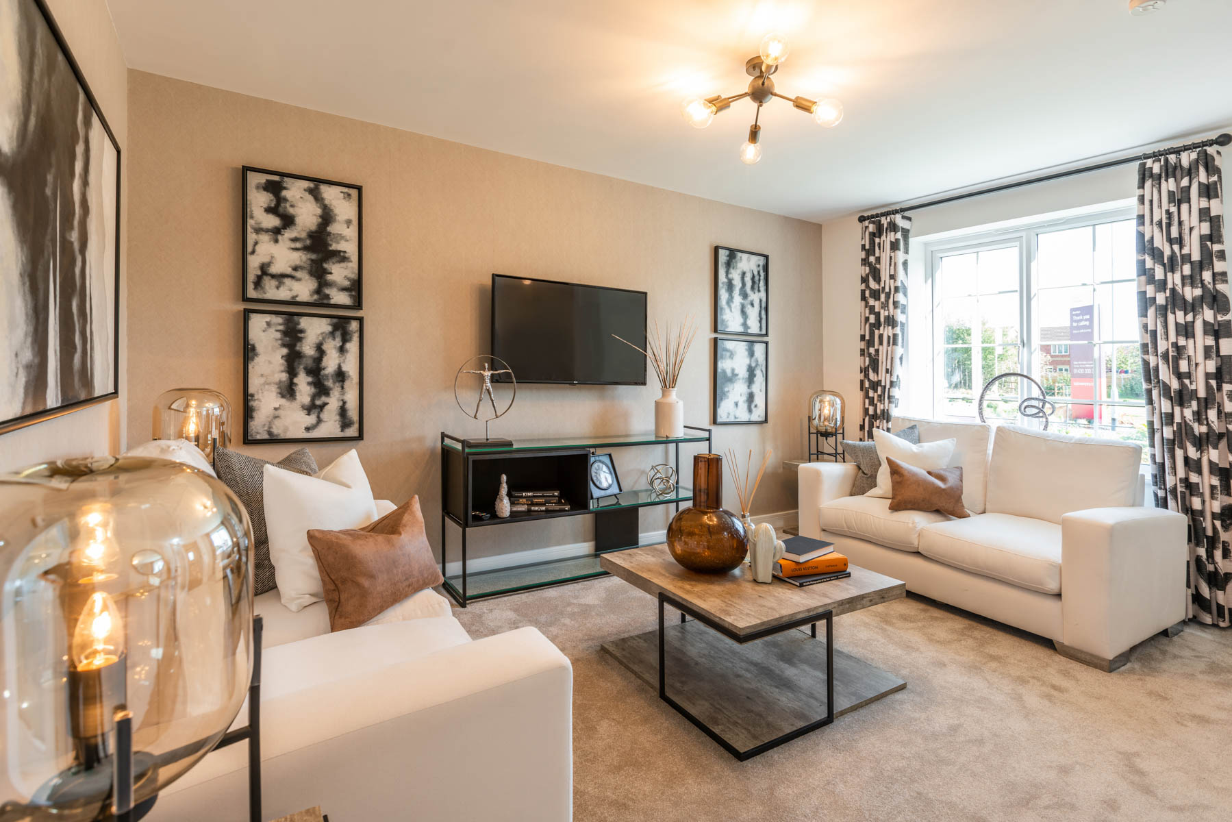 The bright lounge overlooks the front of the home