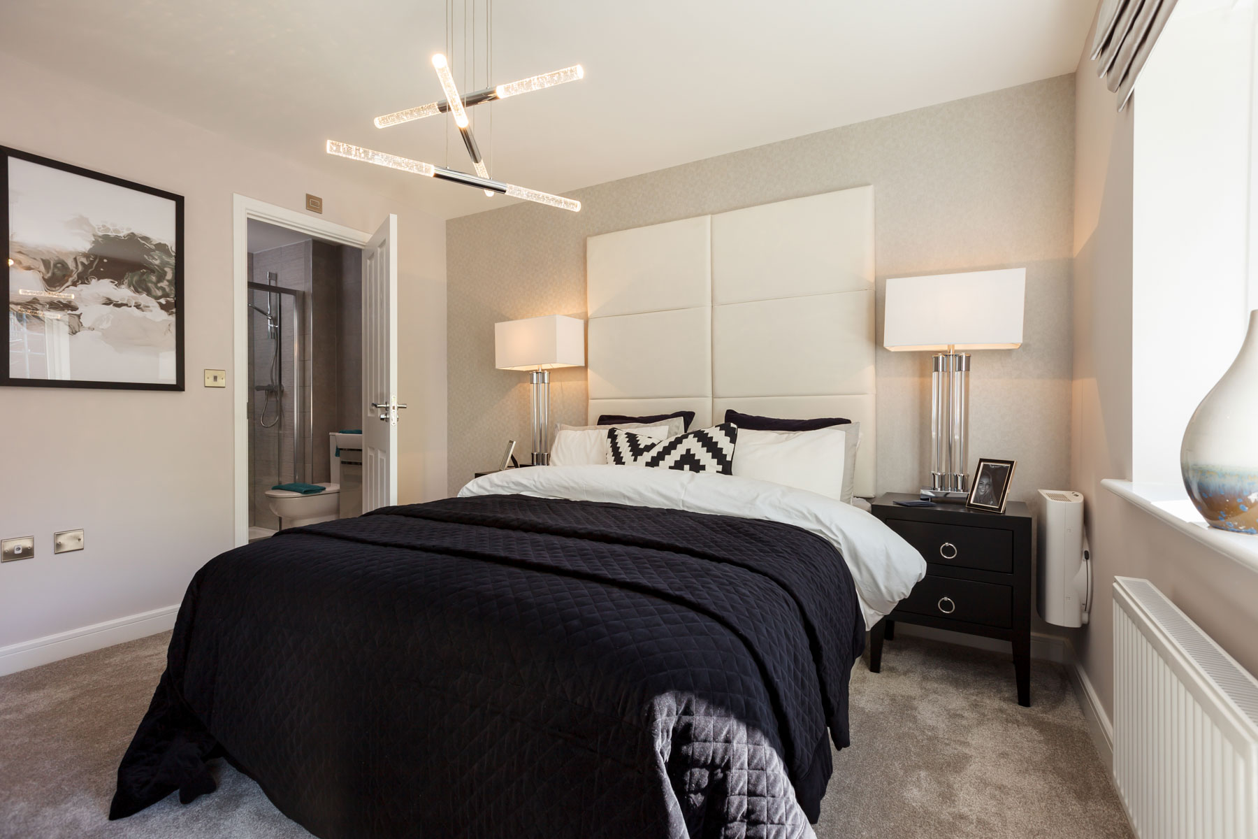 The main bedroom features and en-suite shower room