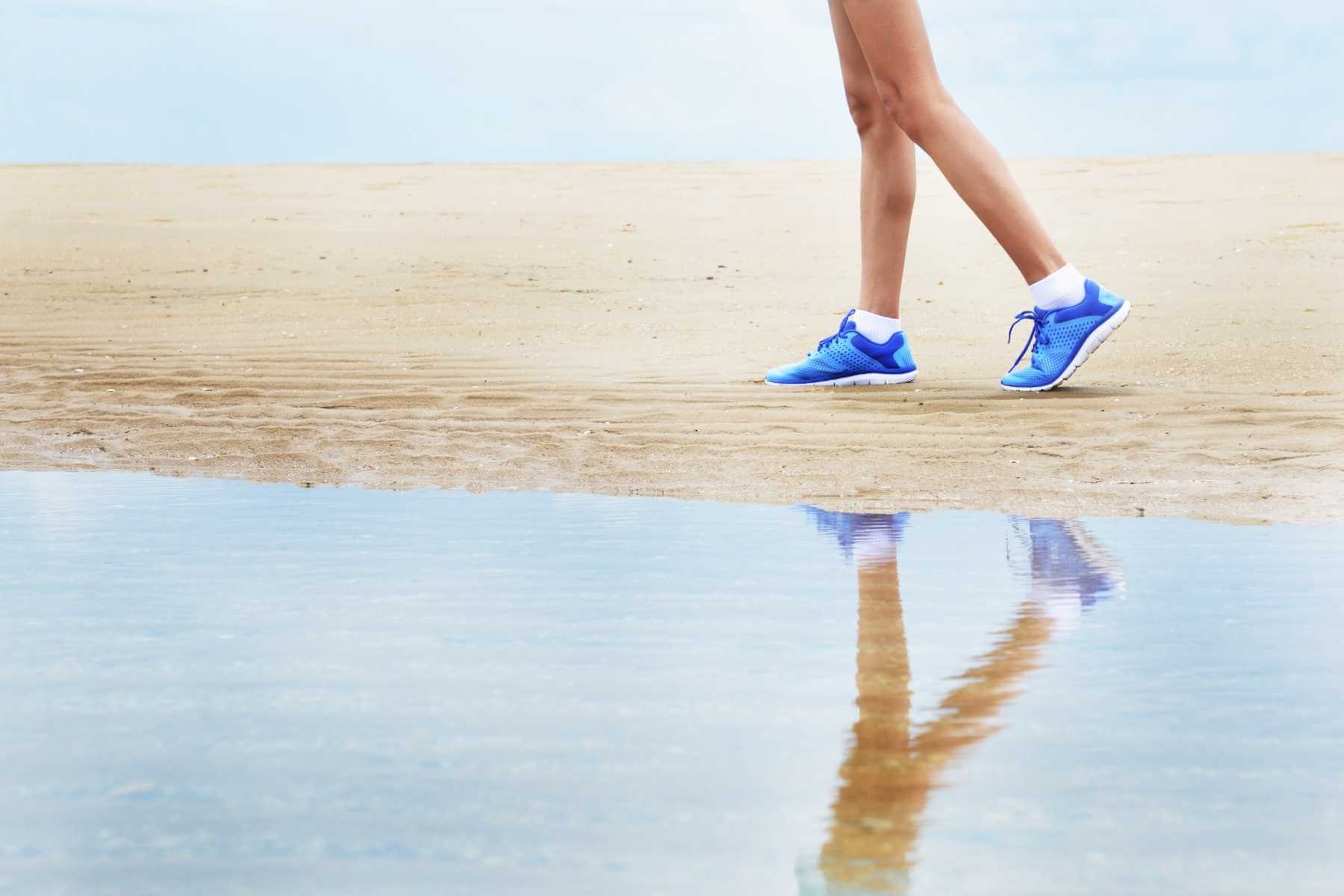 Walking on the beach near the water