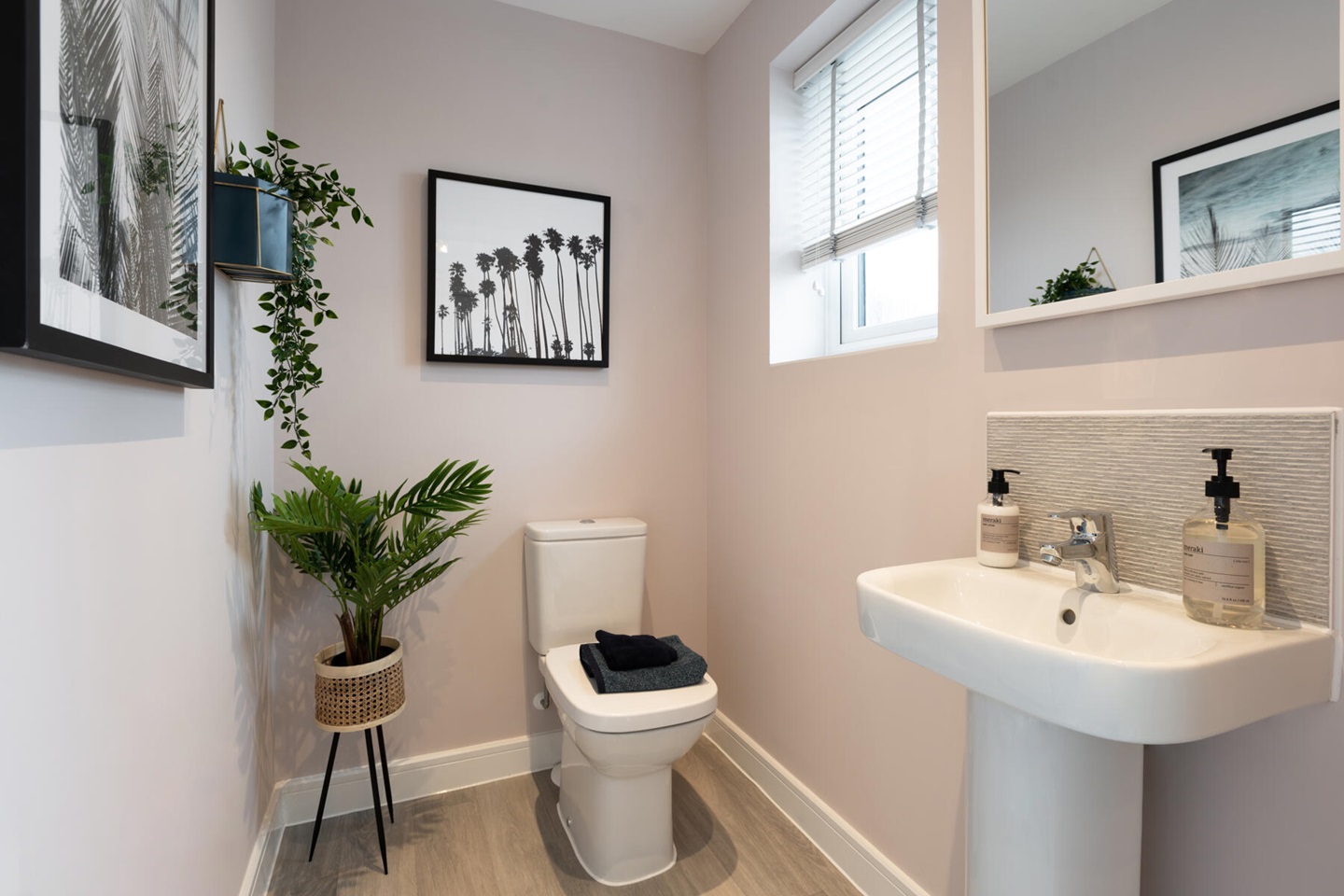 A handy downstairs toilet sits off the entrance hall