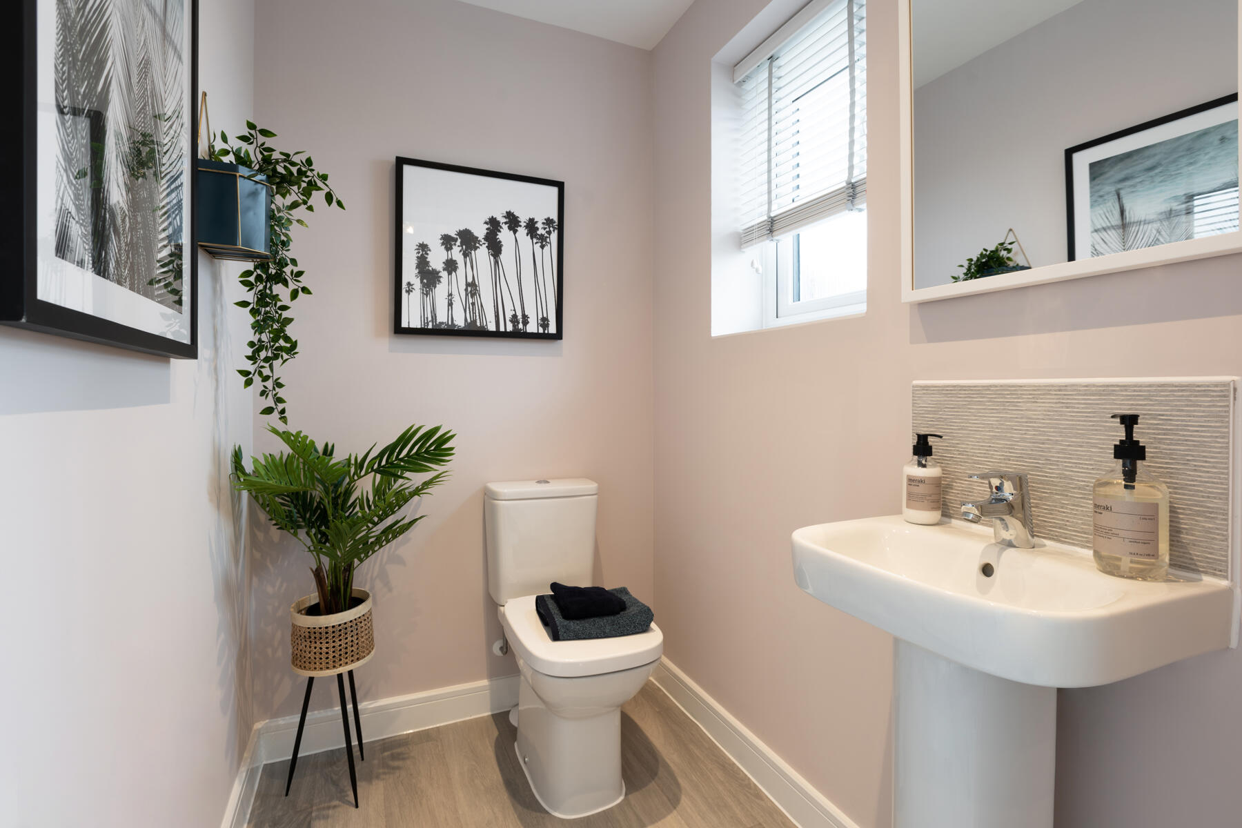 A handy downstairs toilet sits off the entrance hall