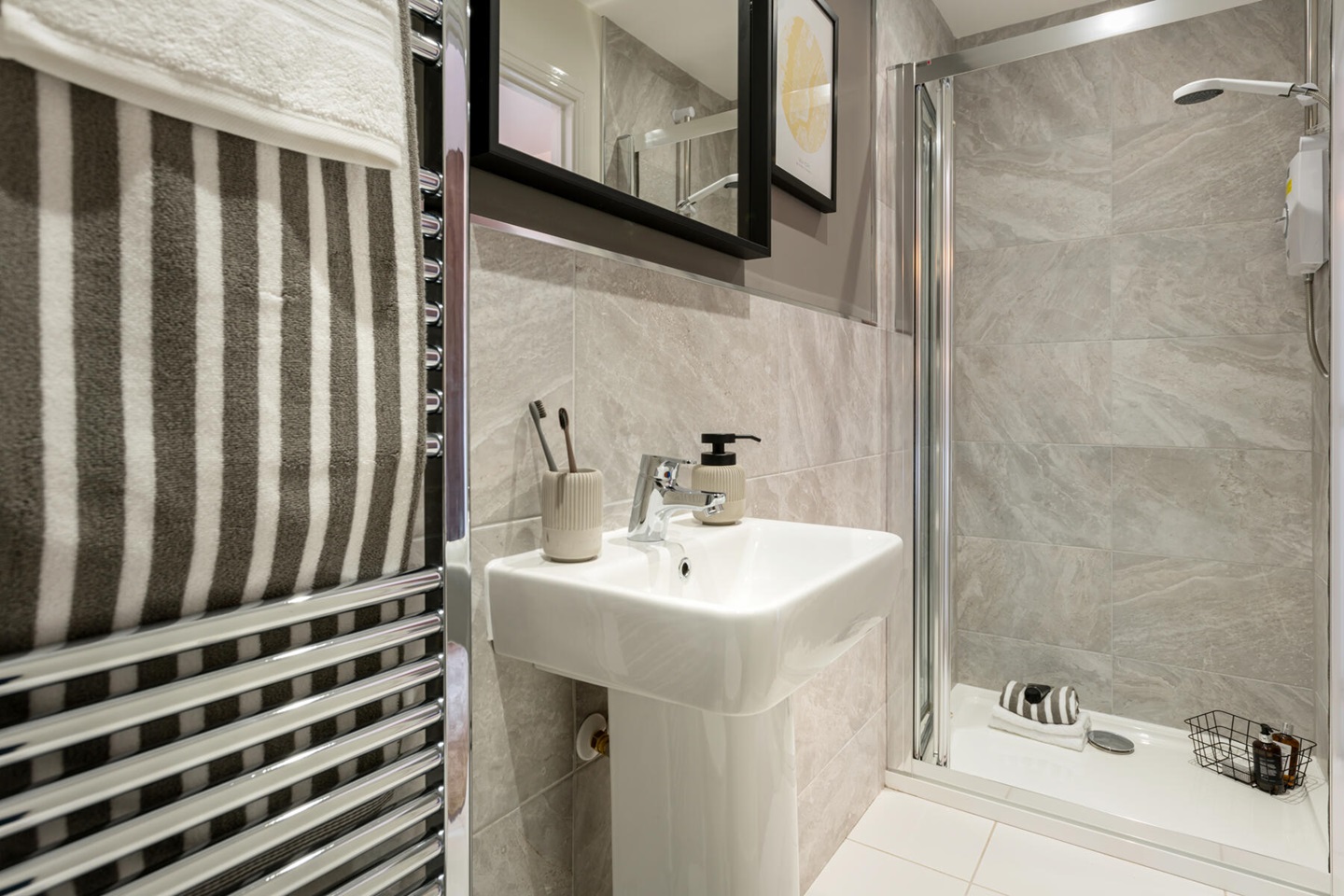 Bedroom 1 features an en-suite bathroom