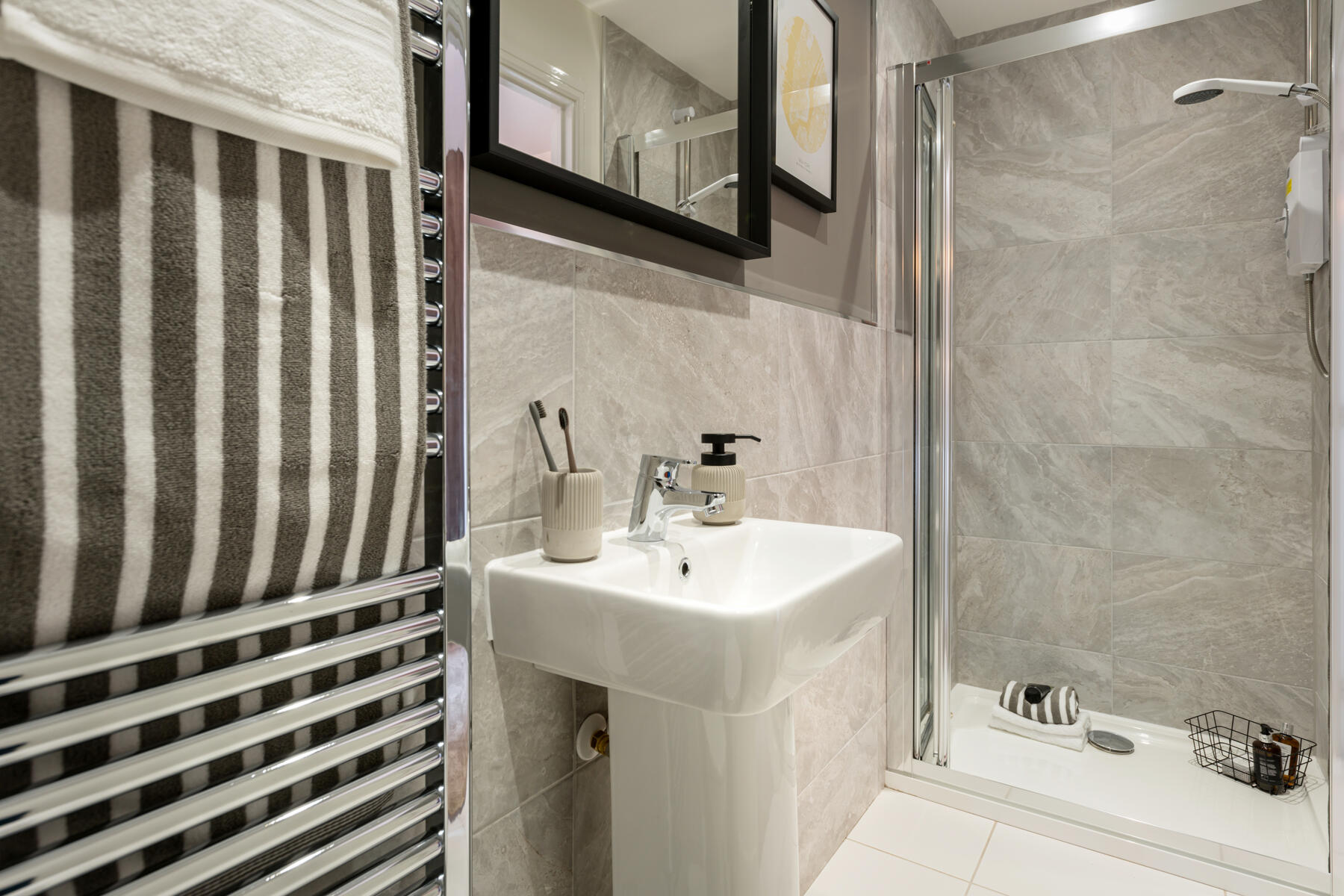 Bedroom 1 features an en-suite bathroom