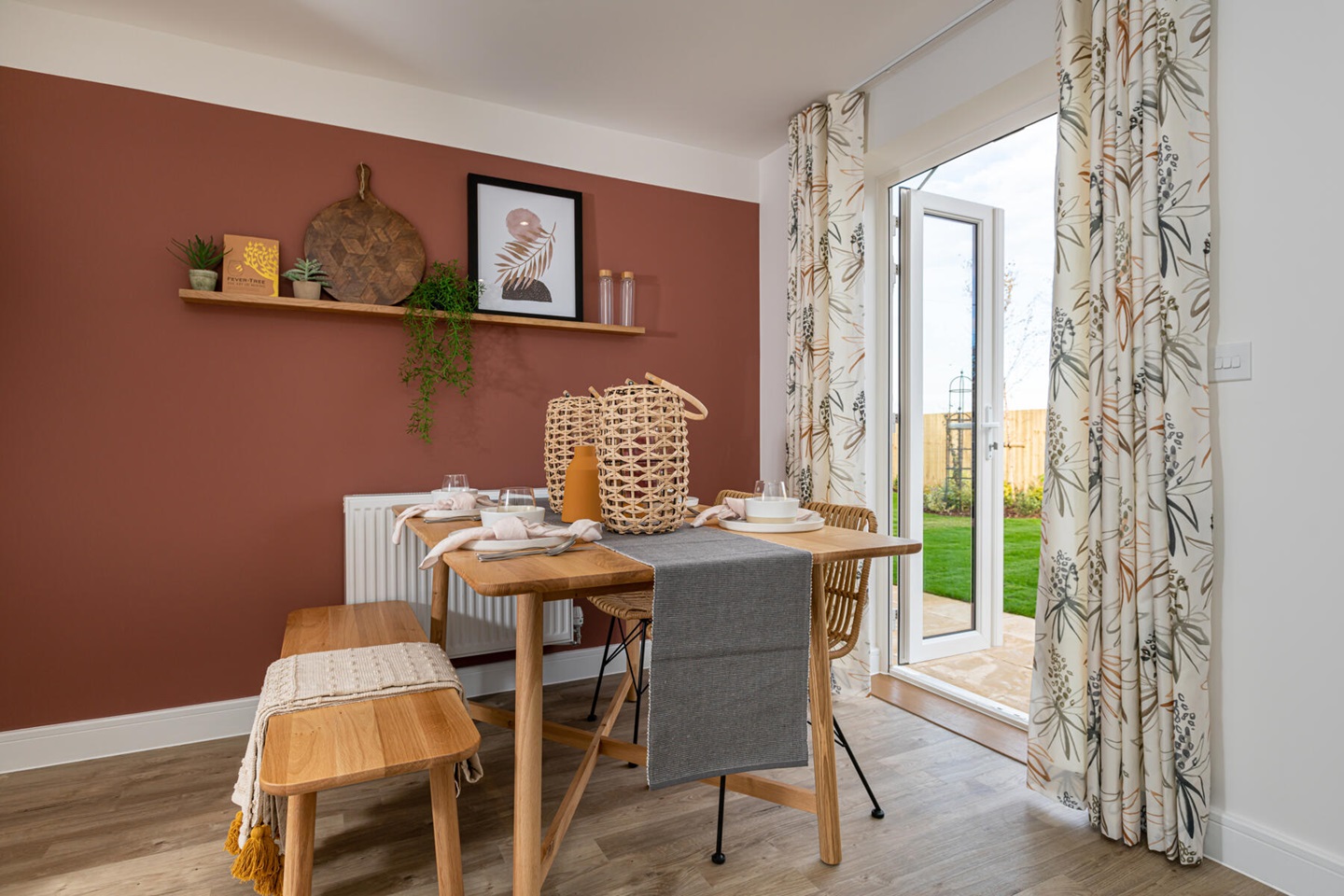 Double doors lead out from the dining area to the garden