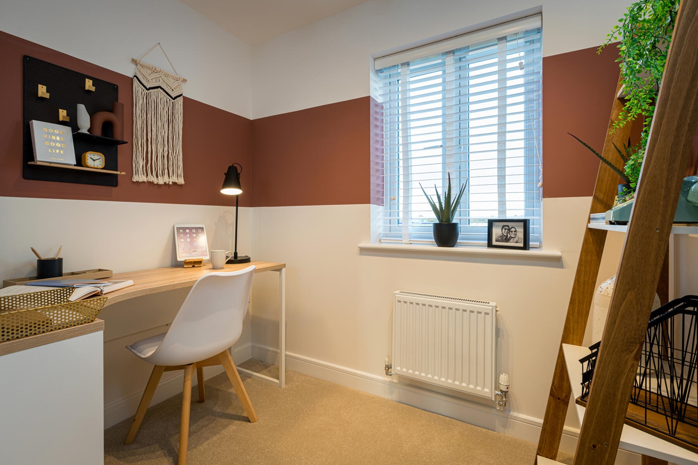 A well proportioned home office sits off the landing