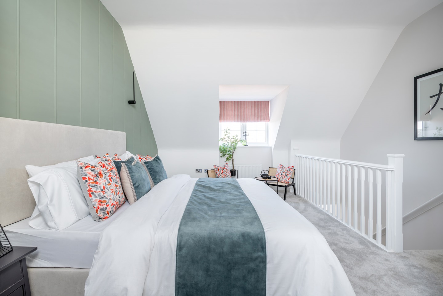 Tall ceilings and an open staircase make this bedroom a showstopper
