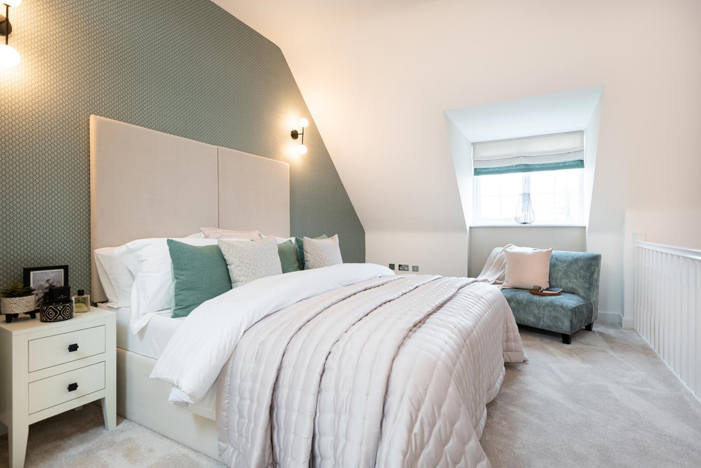 Tall ceilings and an open staircase make this bedroom a showstopper