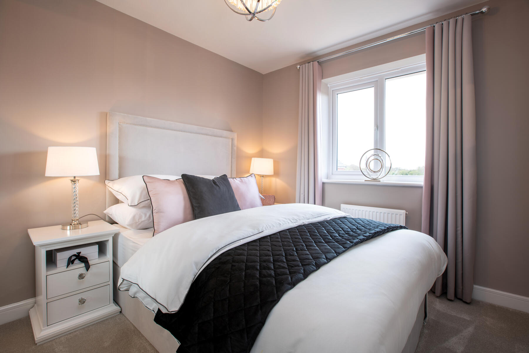 A second double bedroom with space for storage