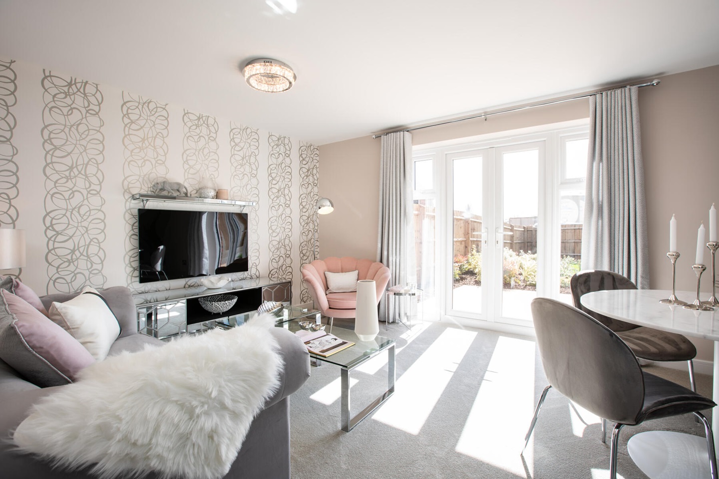 Double doors lead from the lounge out to the garden