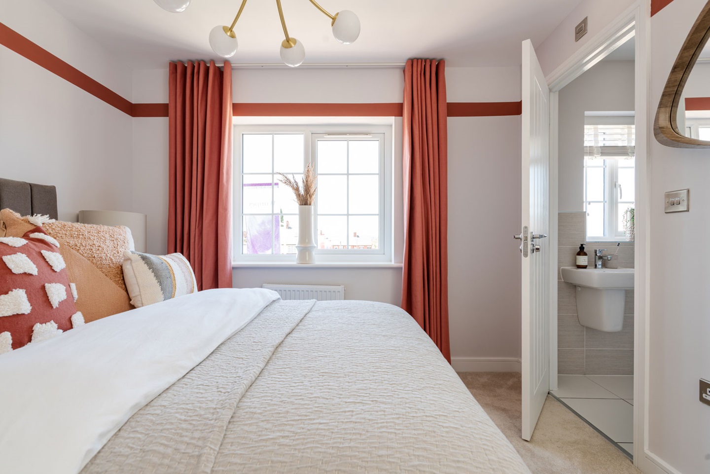 The main bedroom is cosy and bright