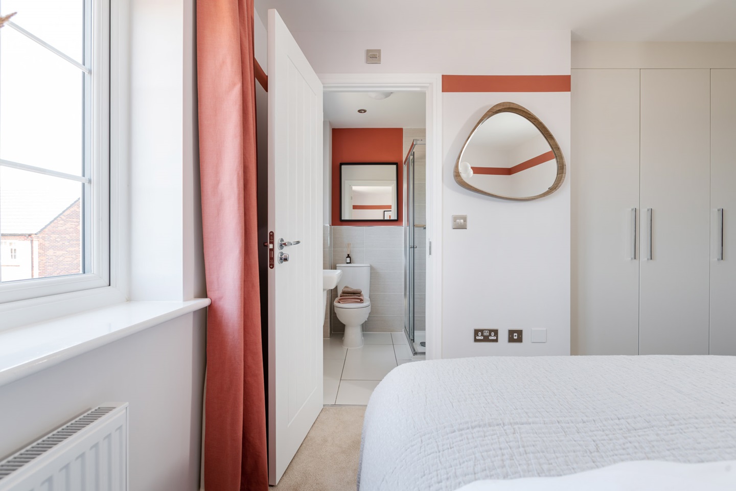 A handy en-suite shower rooms sits off the main bedroom