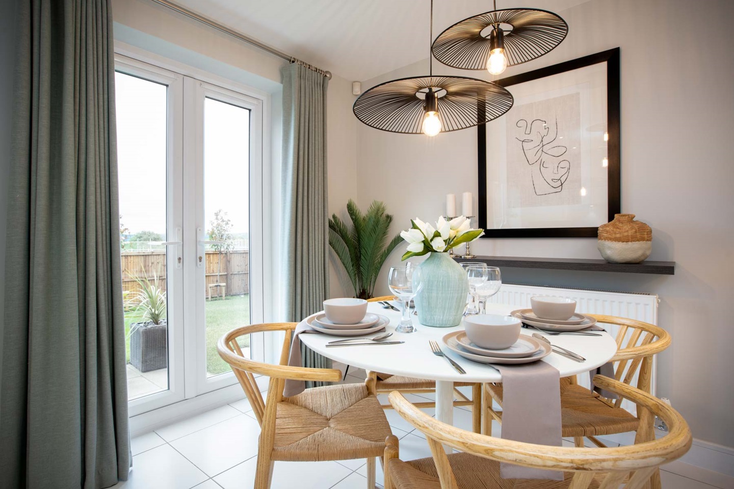 Double doors lead out to the garden from the dining area