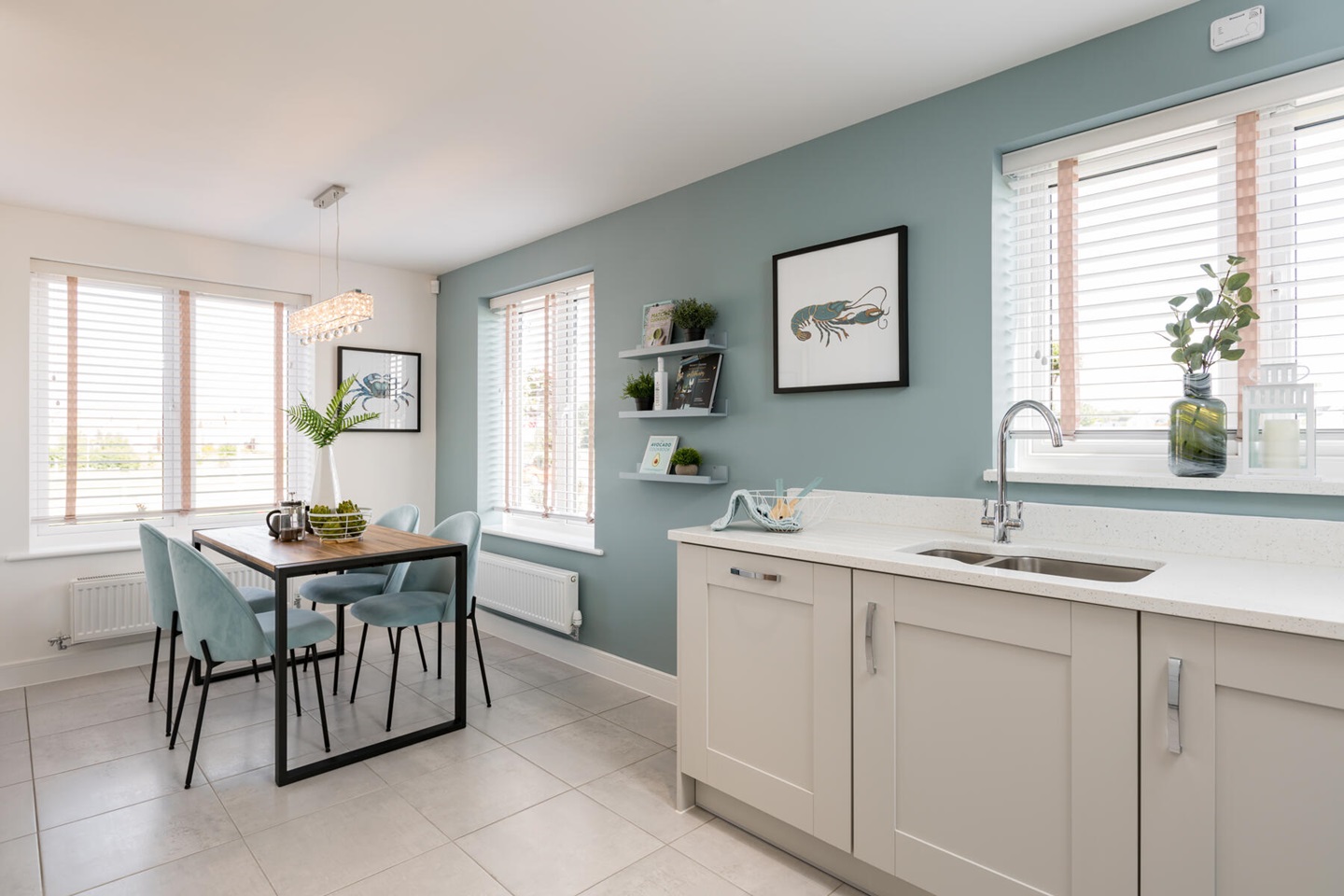 Large windows provide ample natural light to the kitchen