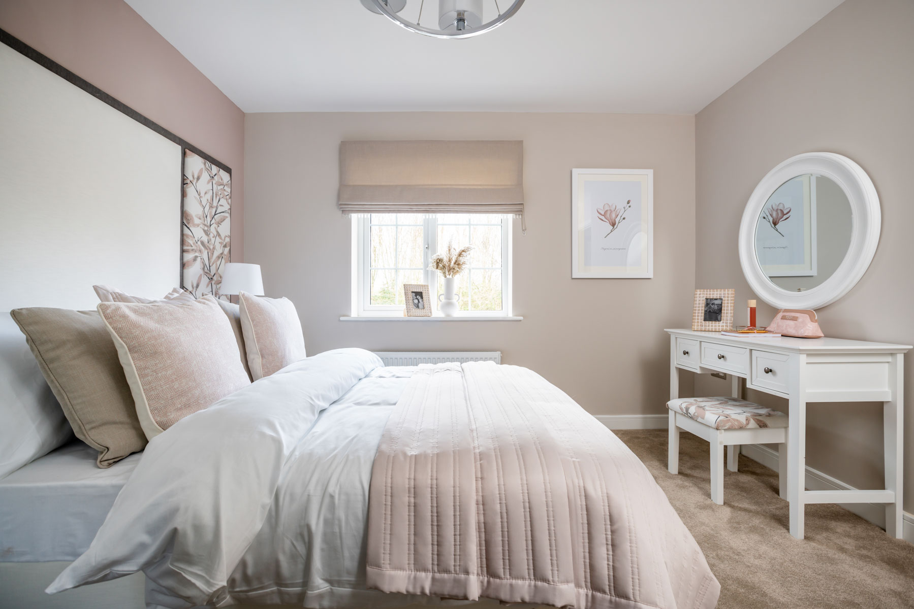 Bedroom 2 offers space for a double bed and storage