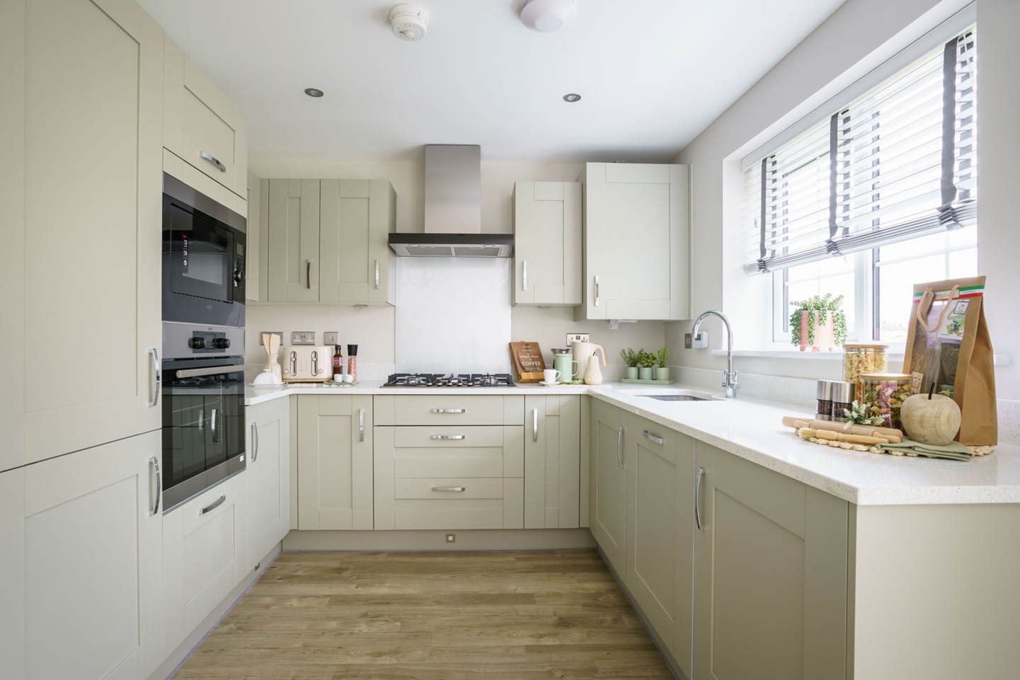 The bright kitchen has ample storage