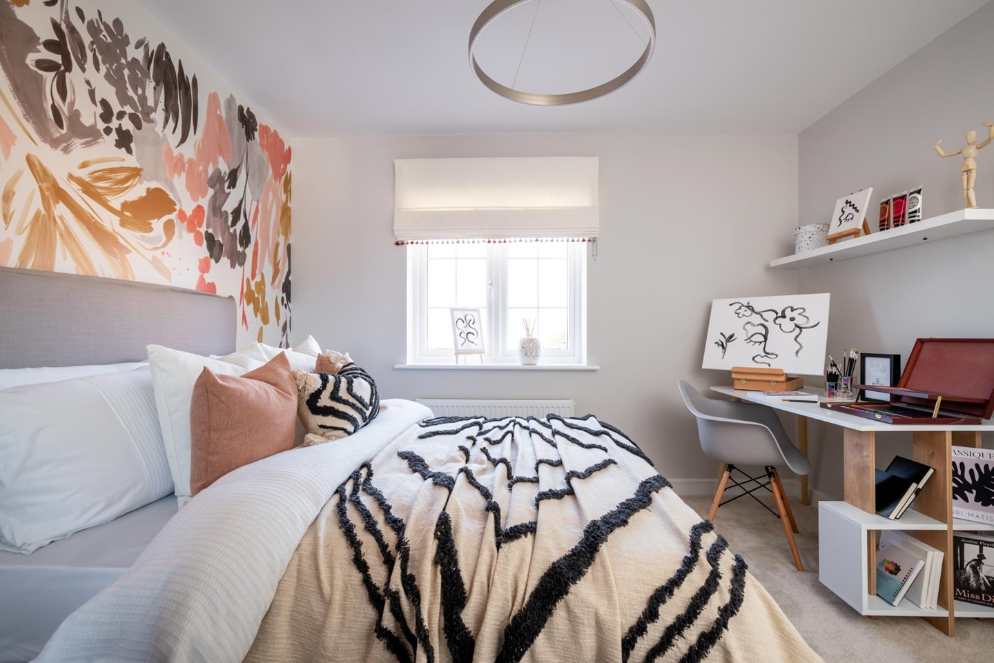Bedroom 2 offers space for a double bed and storage