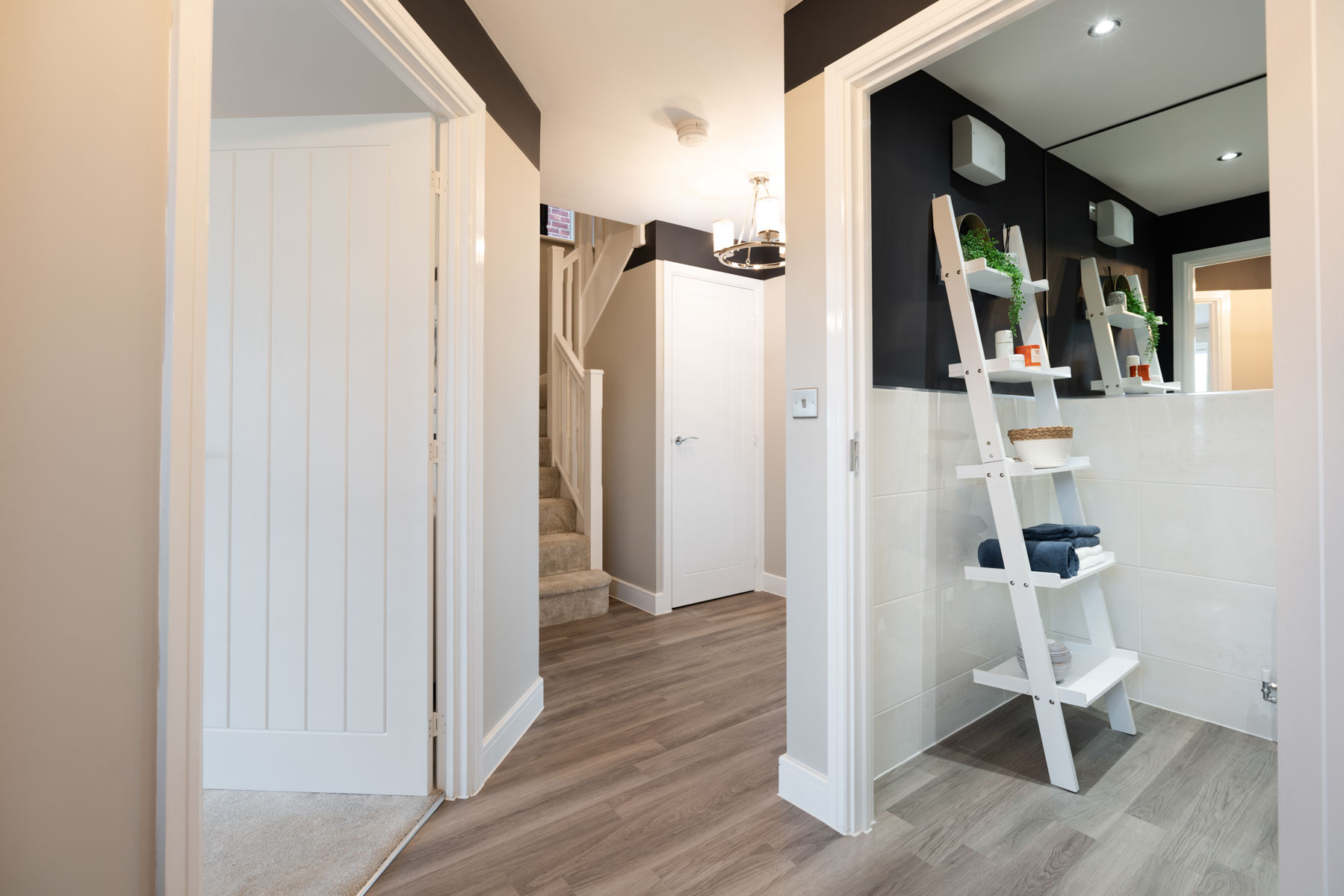 A handy downstairs toilet sits off the main hallway