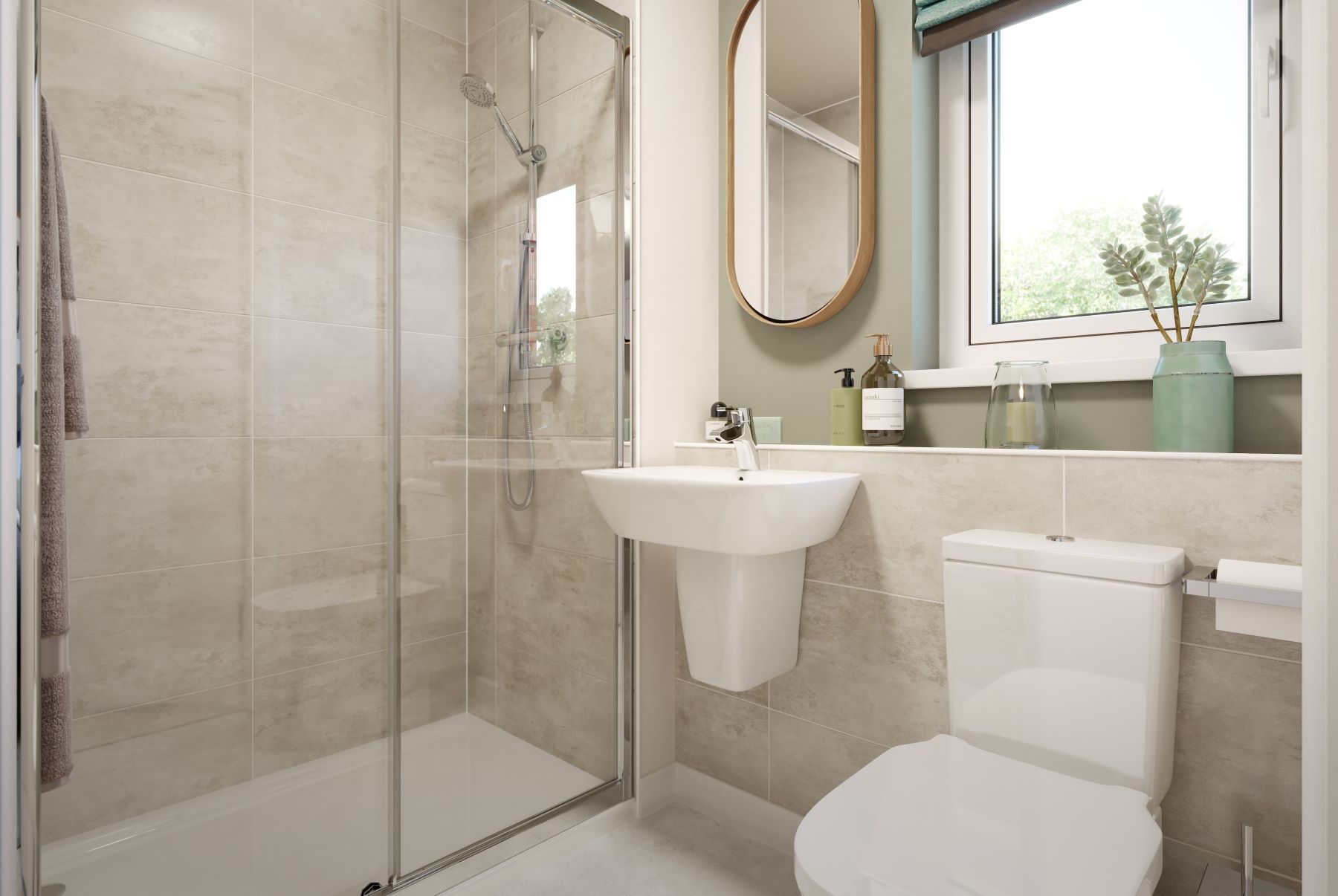 The en-suite benefits from a large double shower