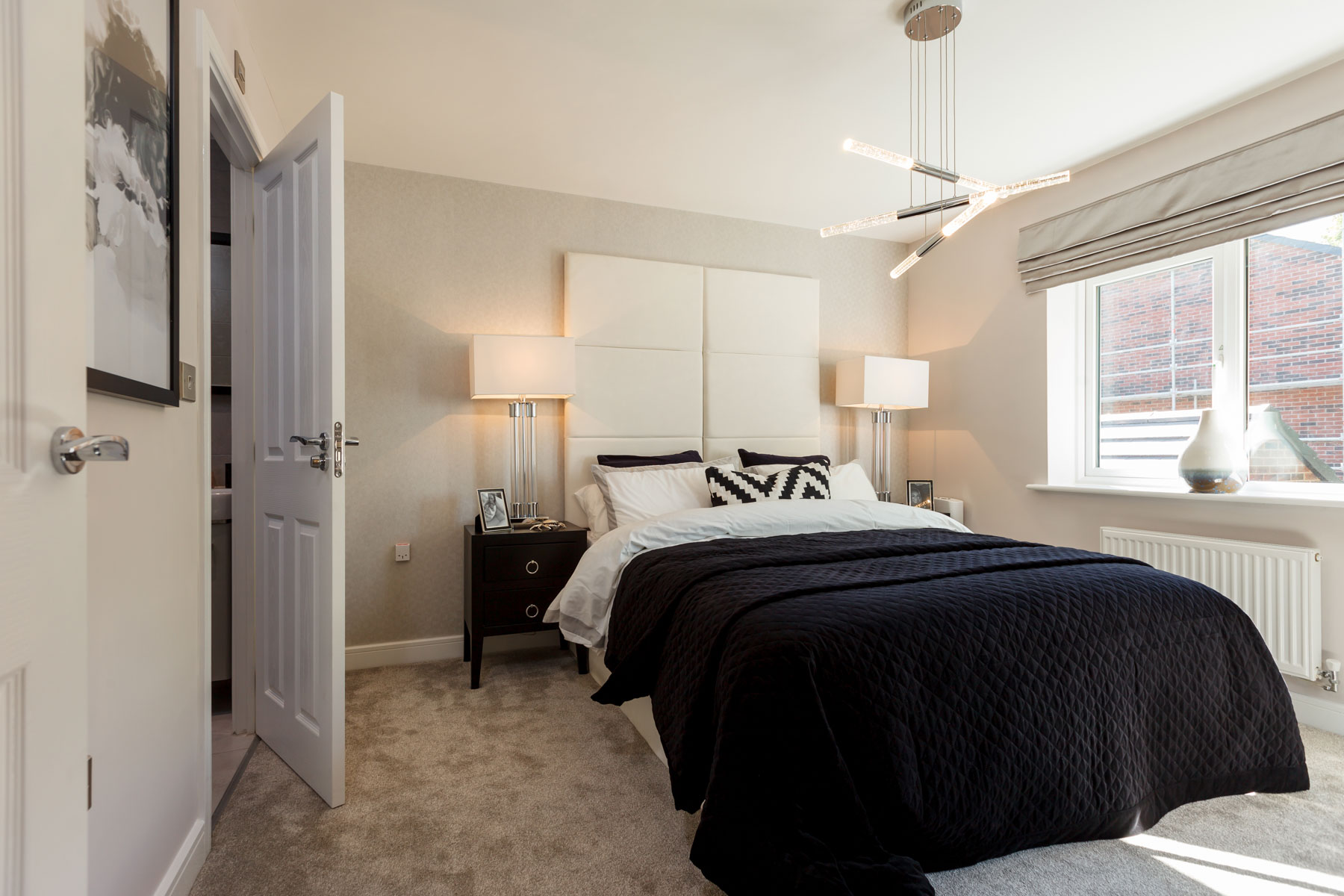 A spacious main bedroom with room to add a fitted wardrobe