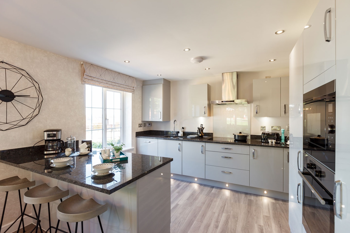 The open-plan kitchen adds plenty of storage to the home