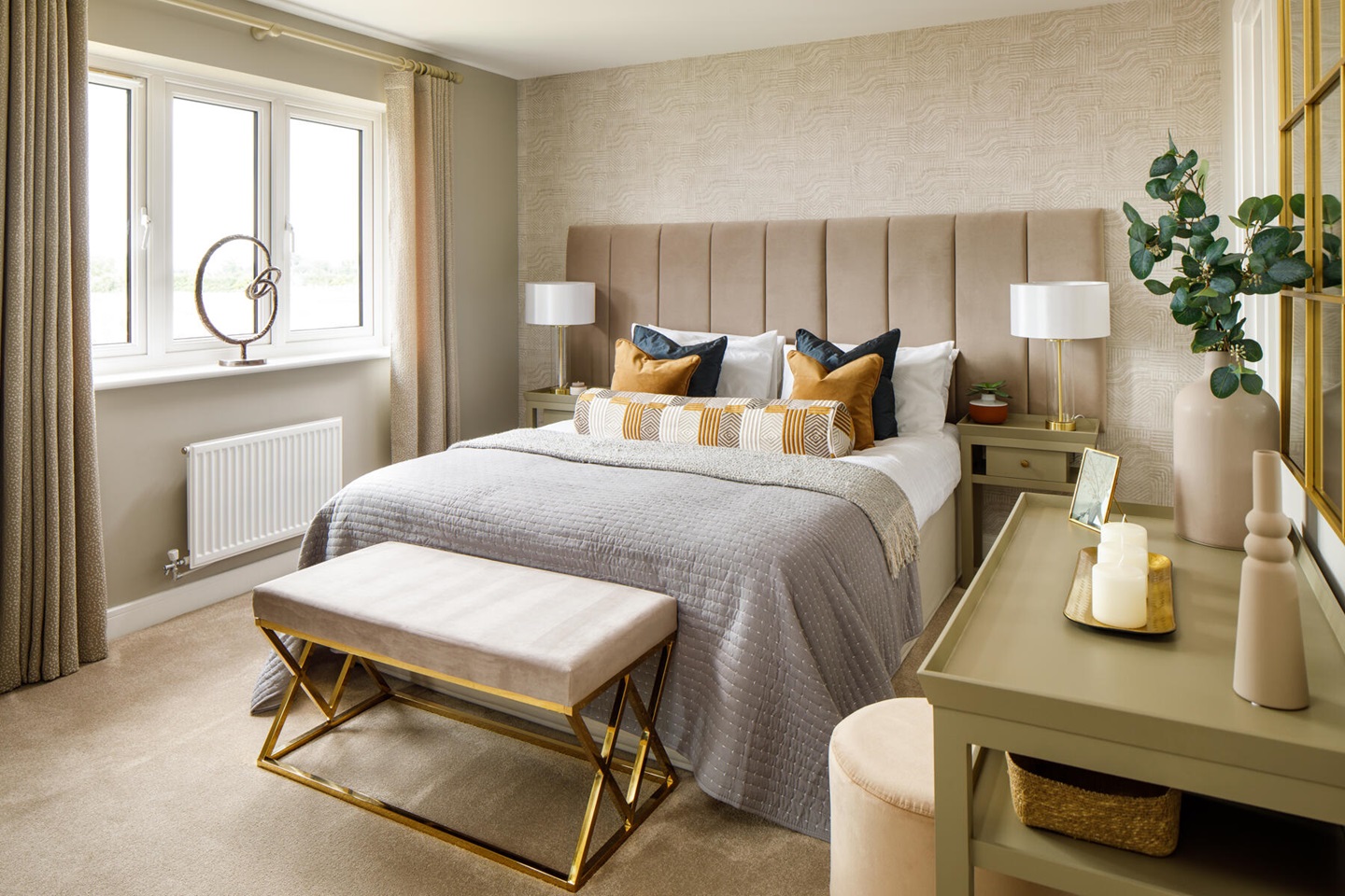 Large windows fill the main bedroom light