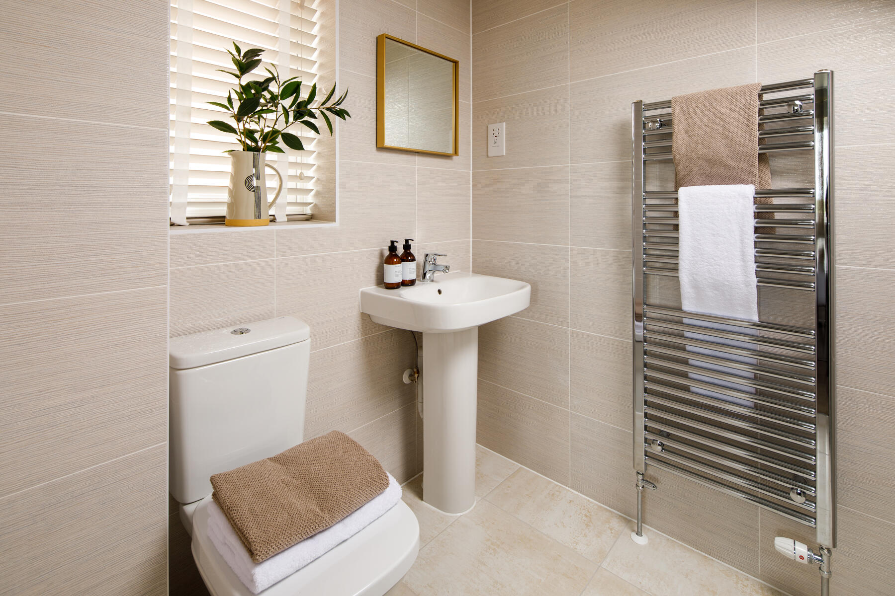 The ensuite bathroom features a double shower
