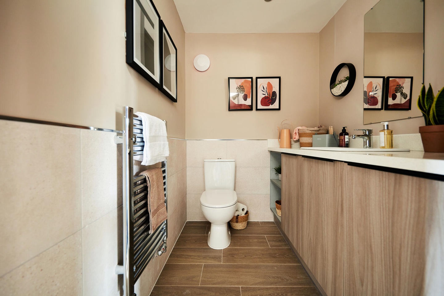 The downstairs toilet features utility space