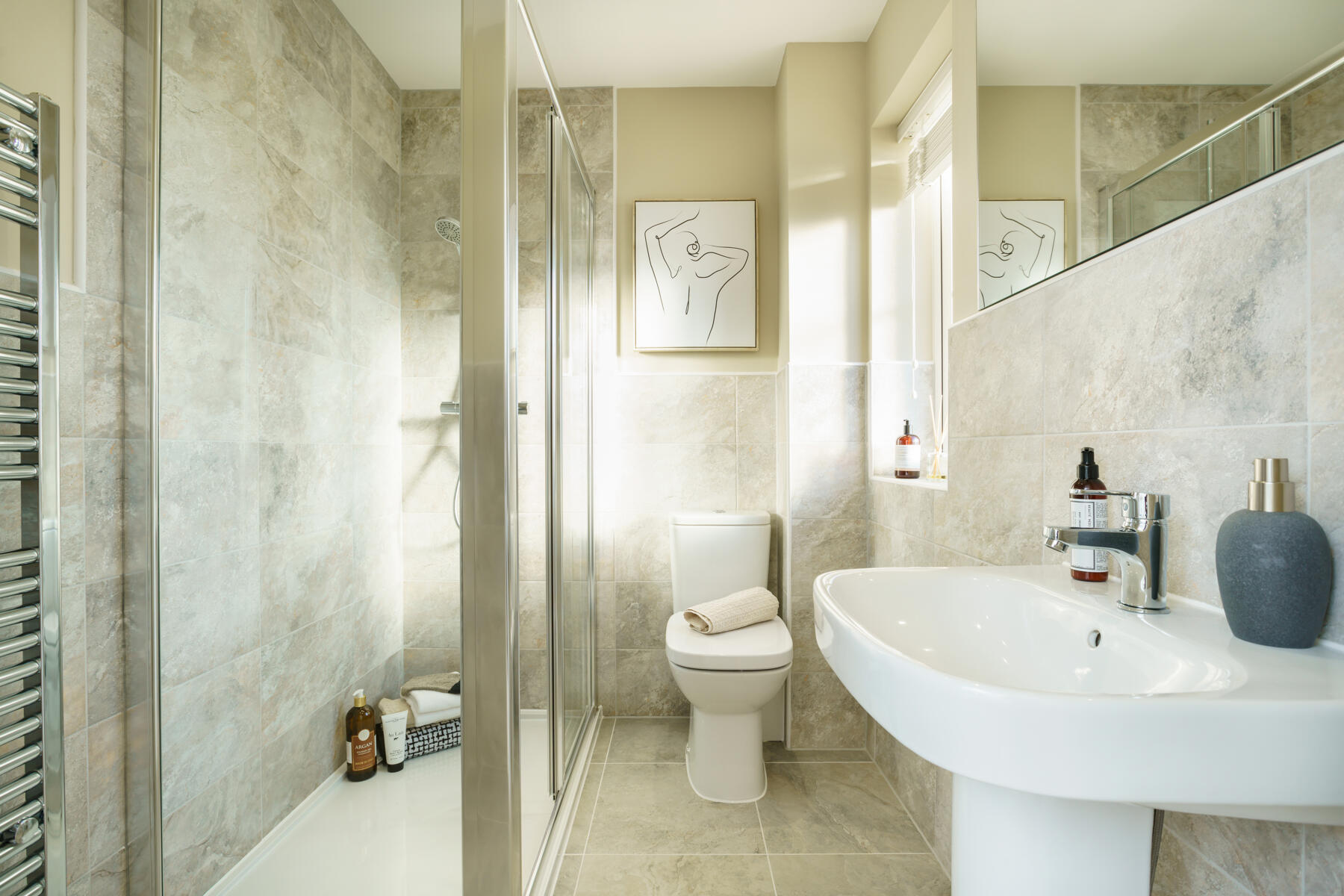 The en-suite bathroom features a large double shower