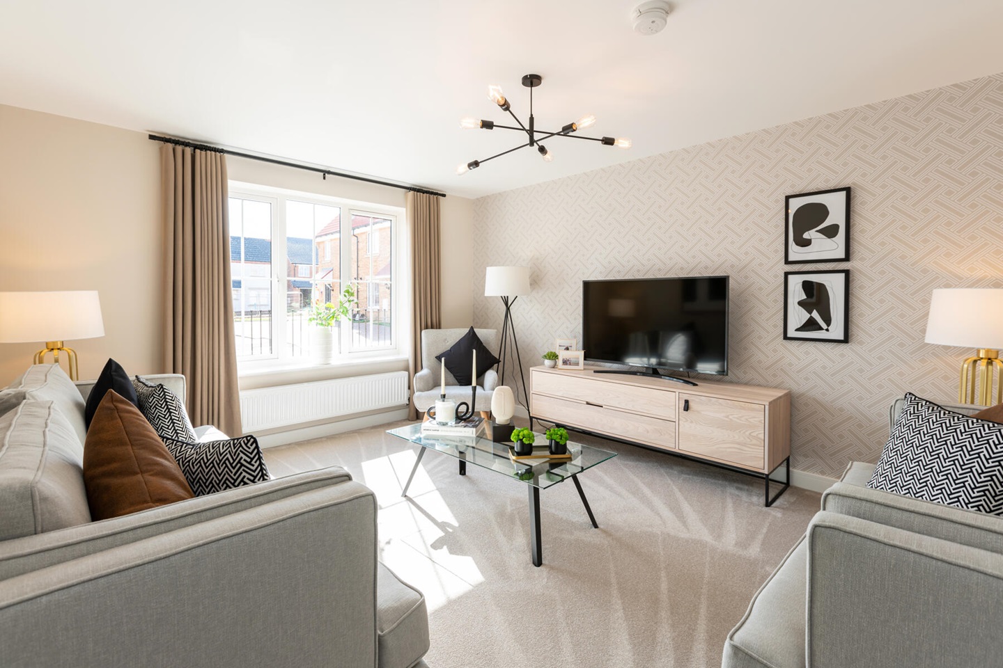 A bright and spacious lounge sits at the front of the home