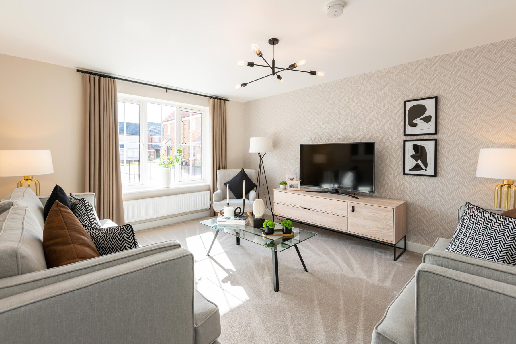 A bright and spacious lounge sits at the front of the home
