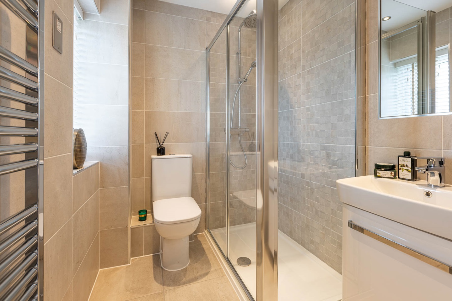 The en-suite features a double shower