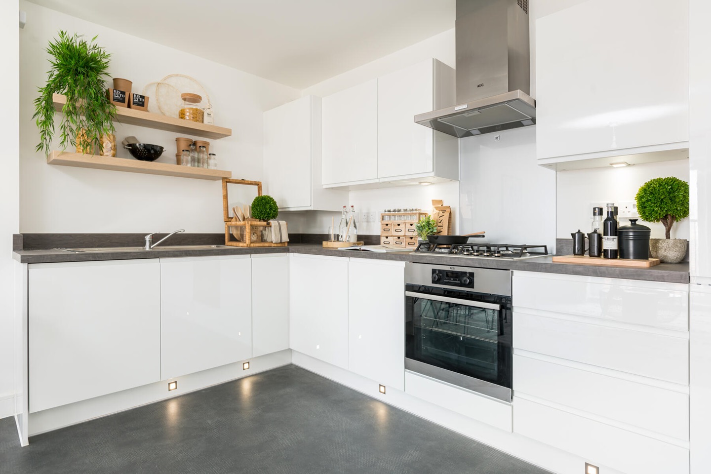The modern kitchen features plenty of storage